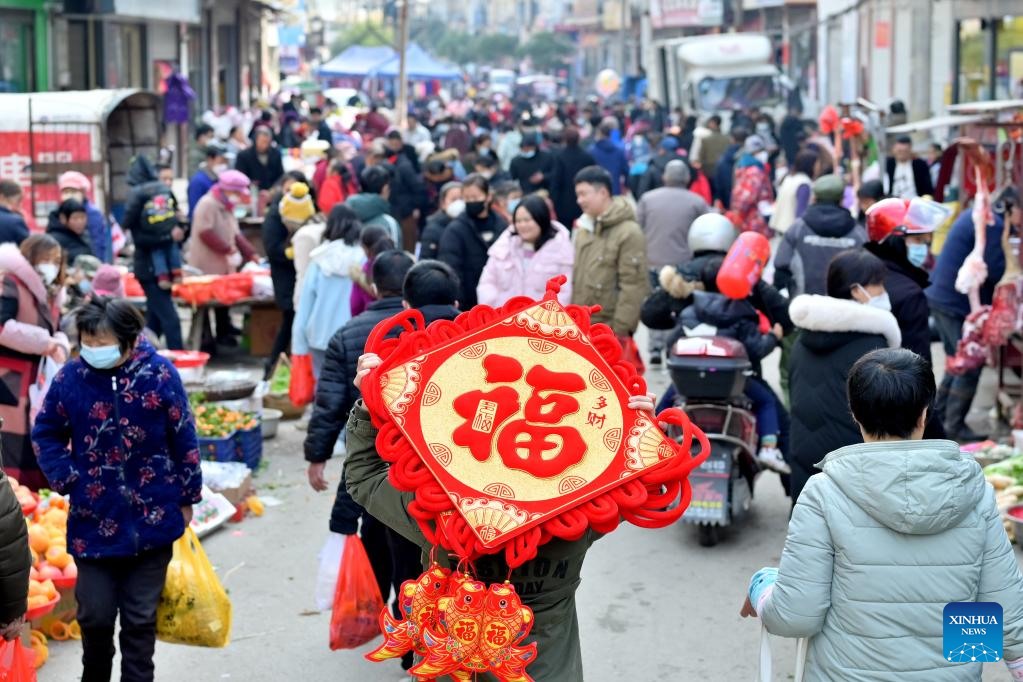 Chợ Tết ở thị trấn Jingzi, huyện Song Phong, tỉnh Hồ Nam, miền trung Trung Quốc ngày 18.1. Ảnh: Xinhua
